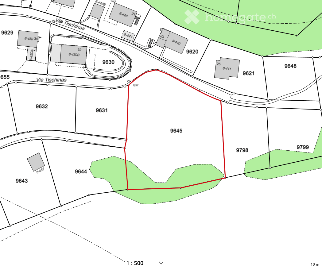 Floor plan showing multiple plots and structures with labeled areas and boundaries.