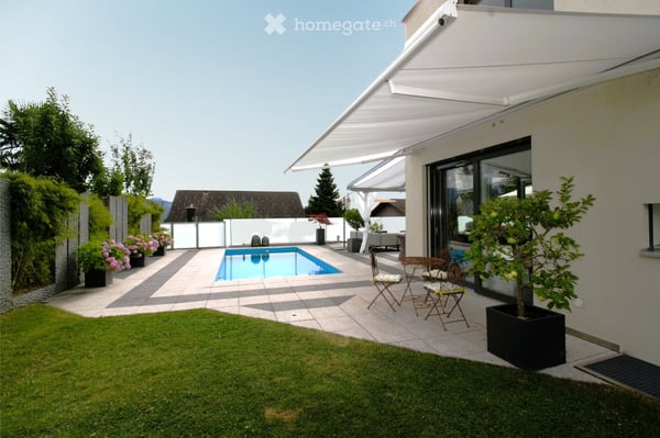 Familienparadies: 7,5 Zimmer-Einfamilienhaus mit beheiztem Pool, Garten und Photovoltaik 3