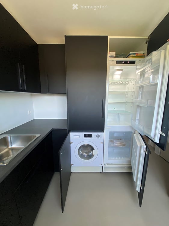 Grand appartement 2.5 pièces rénové avec terrasse dans quartier tranquille 14
