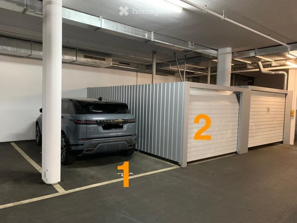 Une place de parc et/ou un box de garage dans un parking souterrain à louer 12