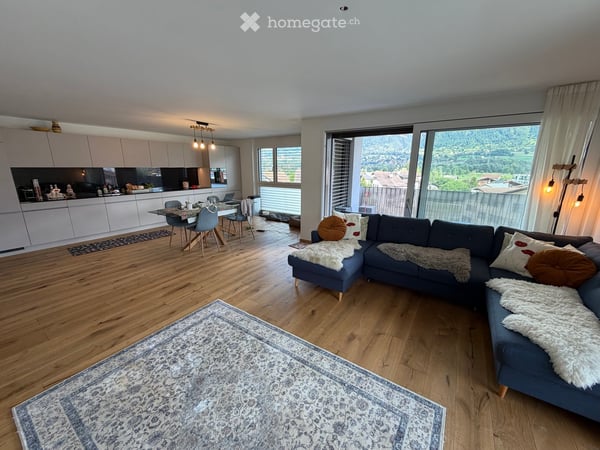 Spacious 4.5-Room Apartment in Cazis – Modern New Build with Stunning Views 1