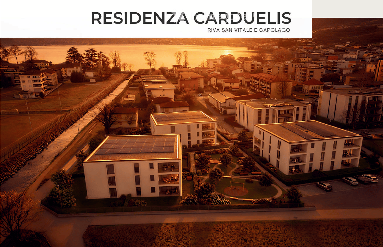 Three apartment buildings, solar panels on roofs, greenery, water body, road, cars parked