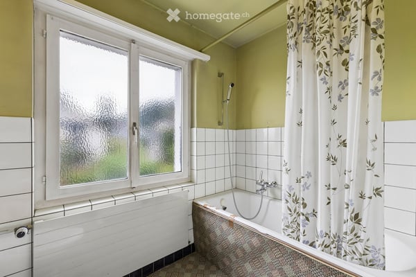 Charmantes 4.5-Zimmer-Doppeleinfamilienhaus mit Garten und Ausbaupotenzial 11