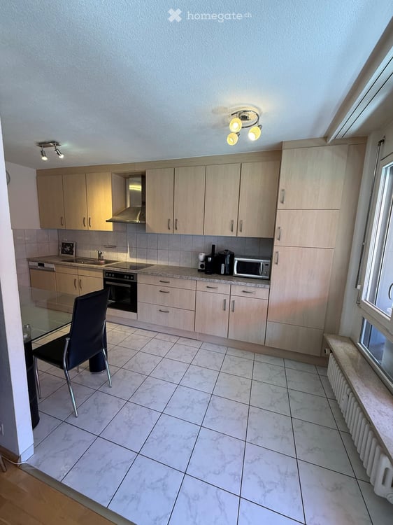 Grosszügige 4.5-Zimmerwohnung mit Balkon, Gemeinschaftsgarten & Tiefgaragenplatz in Basel 19
