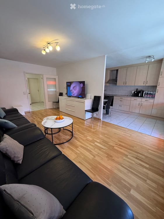 Grosszügige 4.5-Zimmerwohnung mit Balkon, Gemeinschaftsgarten & Tiefgaragenplatz in Basel 10