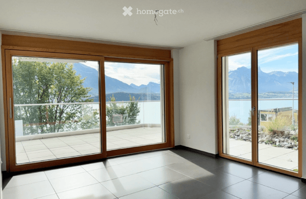 Stilvolle 2.5-Zimmer-Wohnung mit traumhafter See- und Bergsicht in Gunten mit Garage platz inklusive 3