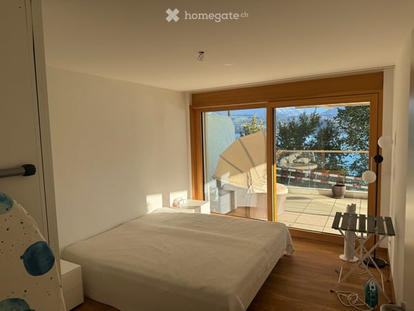 Stilvolle 2.5-Zimmer-Wohnung mit traumhafter See- und Bergsicht in Gunten 17