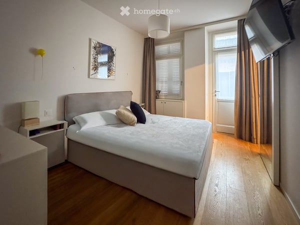 Affascinante casa a schiera ristrutturata a Melide, con vista e accessibilità immediata