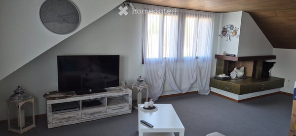 Charmante 3.5-Zimmer-Dachgeschosswohnung mit Balkon in ruhiger Lage 1