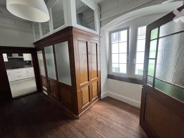 empty room, wooden floor, wooden built-in wardrobe, windows, large room