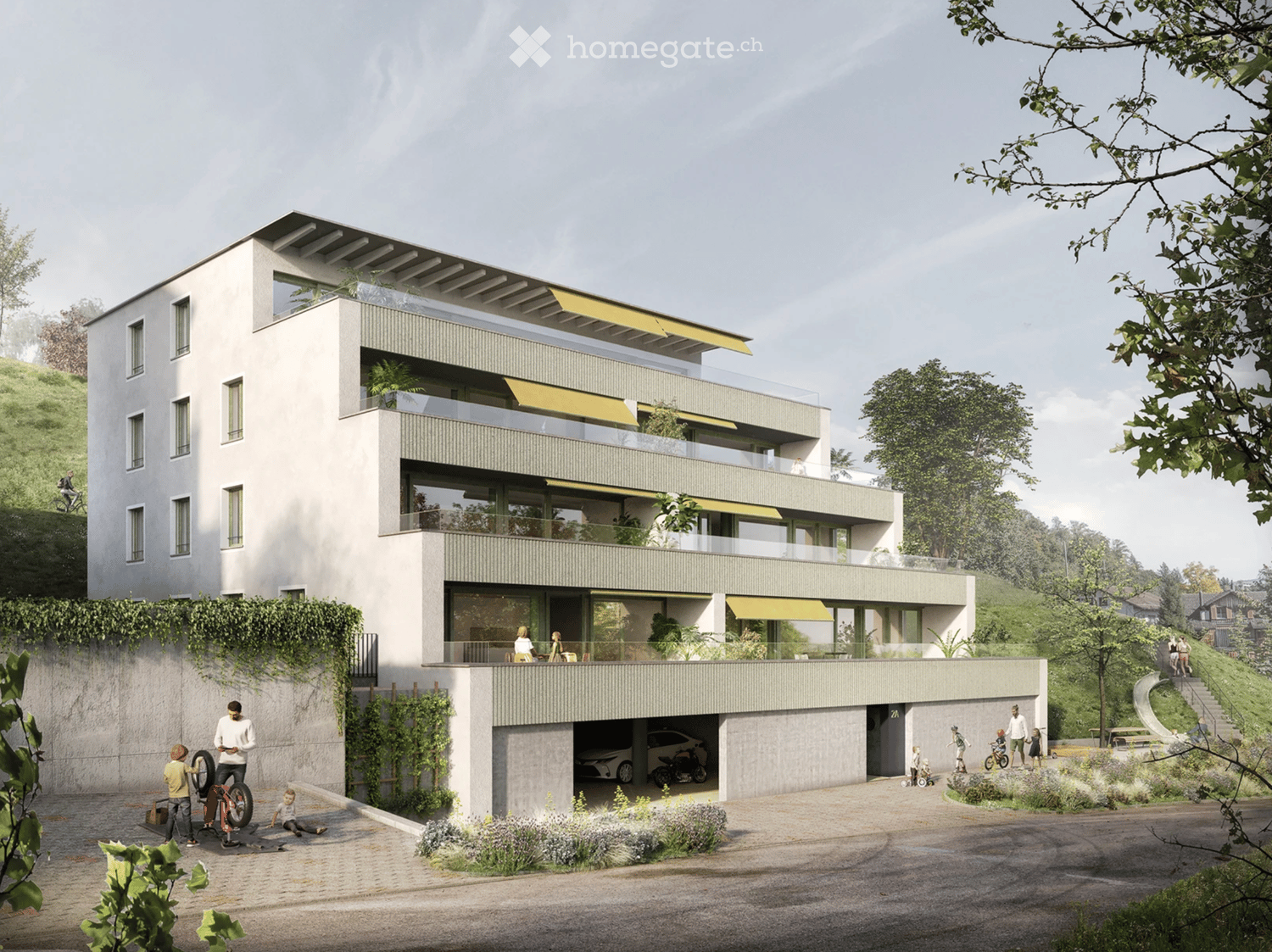 Modern multi-story residential building with balconies, large windows, and a garage. The structure is surrounded by greenery and a paved driveway.