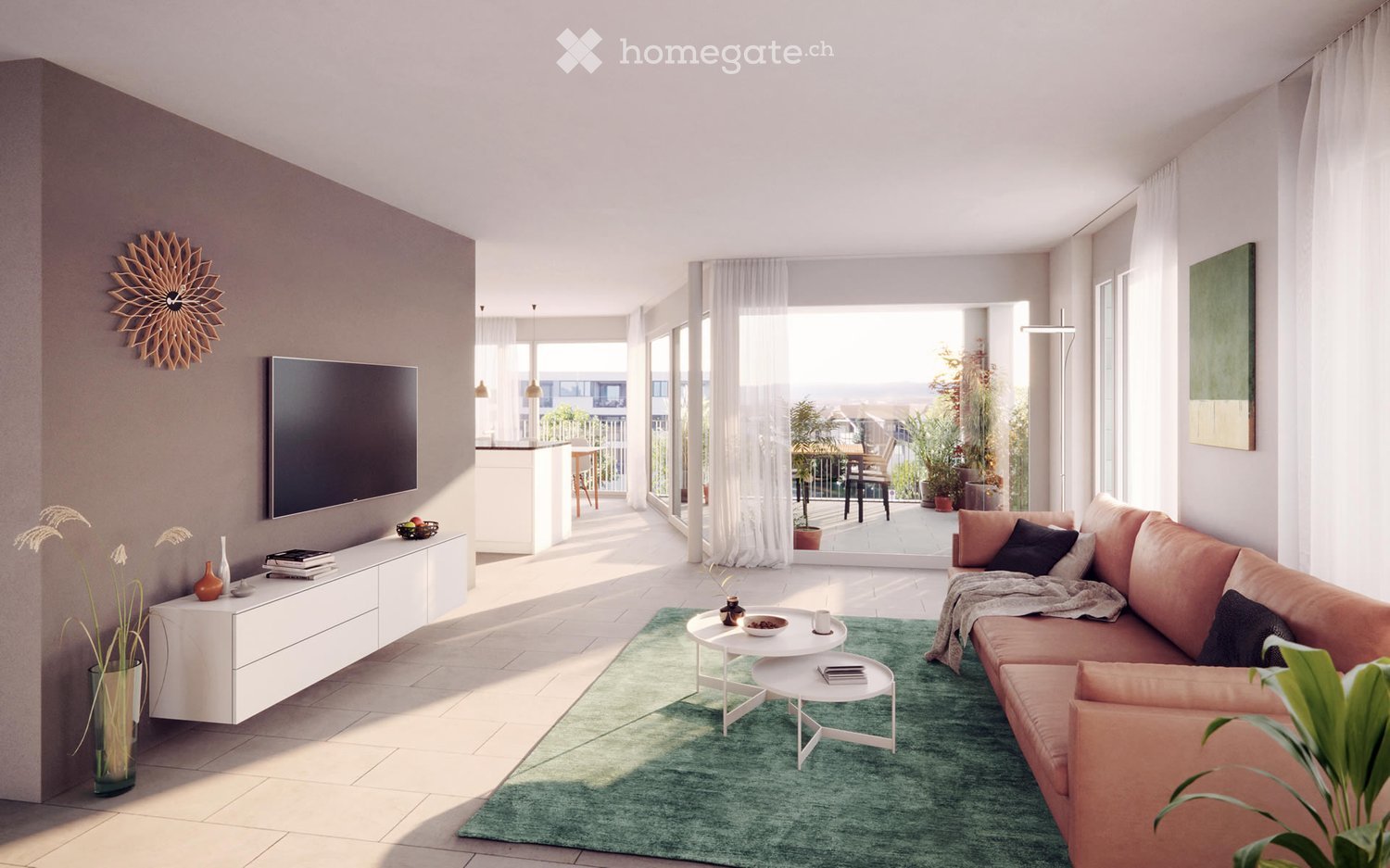 Modern living room with a peach-colored sofa, green area rug, white coffee tables, a flat-screen TV, and a balcony with outdoor furniture visible through large windows.