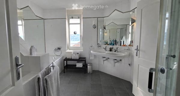 Exklusives 6.5 Zimmer-Einfamilienhaus mit Traumgarten und Seesicht 8