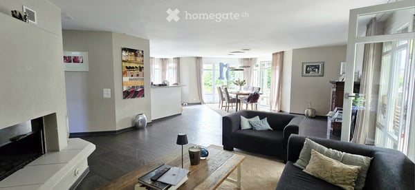 Exklusives 6.5 Zimmer-Einfamilienhaus mit Traumgarten und Seesicht 3