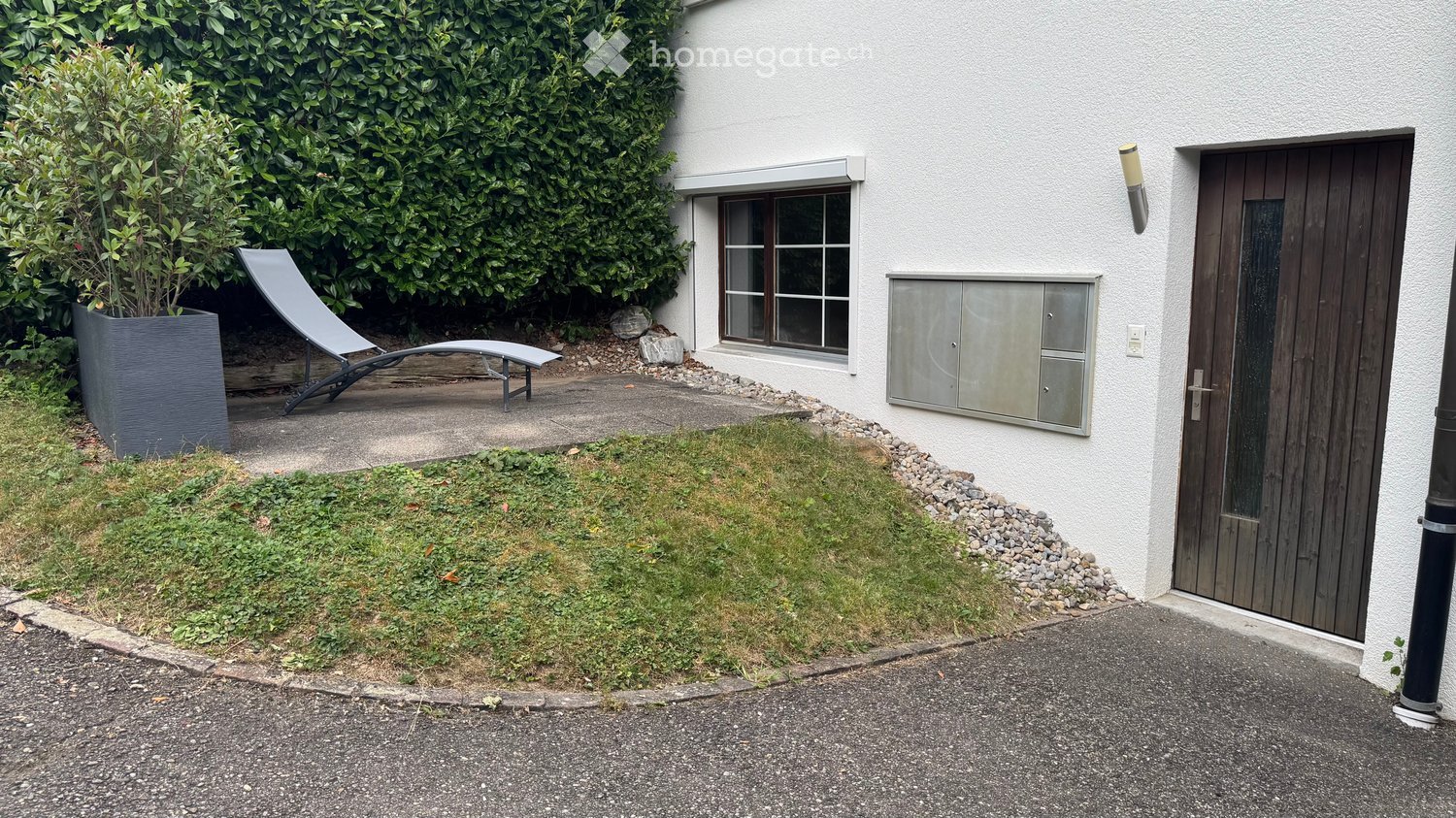 raised ground floor, entrance, small garden, lounge chair, plant