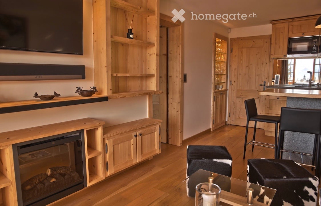 {"visible_features": ["Fireplace"], "type": "Furnished Room", "objects": ["fireplace", "sofa", "stool", "stool", "stool", "stool", "stool", "stool", "stool", "stool", "stool", "stool", "stool", "stool", "stool", "stool", "stool", "stool", "stool", "stool"