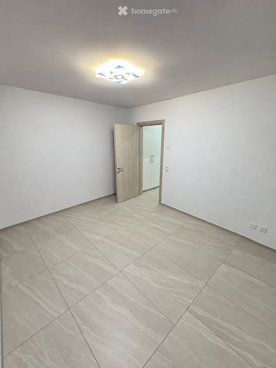 Moderno 2,5 locali con giardino esclusivo a Claro 6