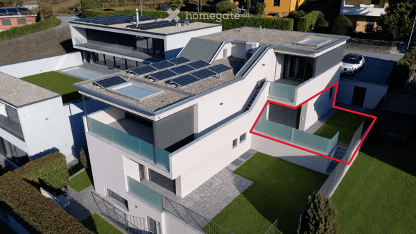 Moderno 2,5 locali con giardino esclusivo a Claro 1