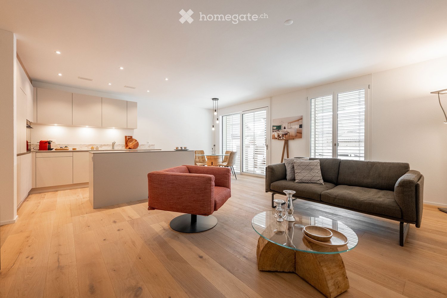{"type": "Furnished Room", "objects": ["sofa", "coffee table", "chair", "kitchen island", "kitchen cabinets", "table", "cupboard", "cupboard", "cupboard", "cupboard", "cupboard", "cupboard", "cupboard", "cupboard", "cupboard", "cupboard", "cupboard", "cup