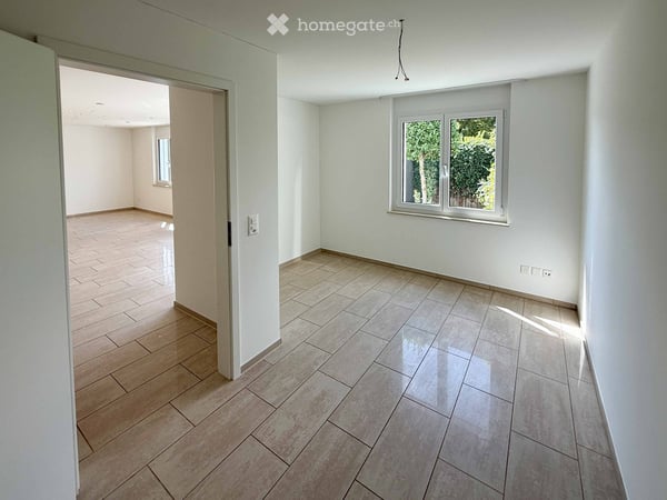 Exklusive 4.5-Zimmer-Gartenwohnung mit vier Parkplätzen, Cheminée und Sauna 12
