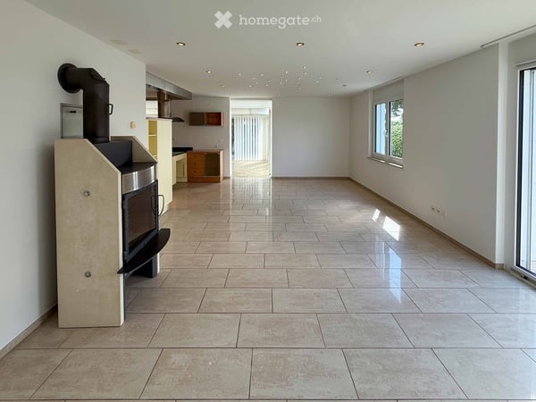 Exklusive 4.5-Zimmer-Gartenwohnung mit vier Parkplätzen, Cheminée und Sauna 3