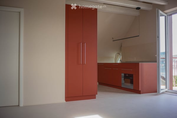 Exceptional Attic Apartment in Thalwil with 180° Views of Lake Zurich and the Alps 3