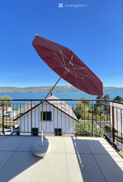 Exceptional Attic Apartment in Thalwil with 180° Views of Lake Zurich and the Alps 1