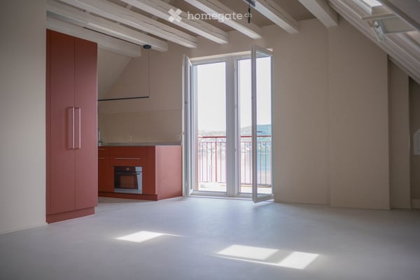 Exceptional Attic Apartment in Thalwil with 180° Views of Lake Zurich and the Alps 4
