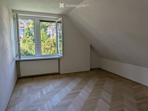 Exceptional Attic Apartment in Thalwil with 180° Views of Lake Zurich and the Alps 2