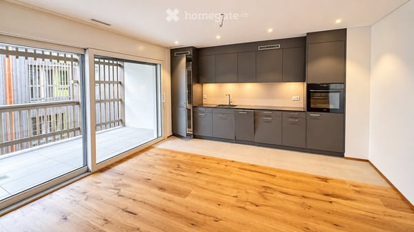 Helle Dachwohnung mit modernem Ausbau und charmanten Holzdetails