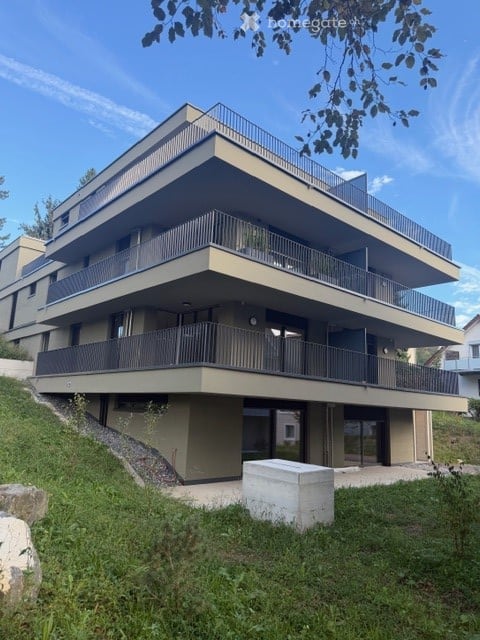 Erstvermietung der modernen 2.5-Zimmerwohnung im EG mit Gartensitzplatz in Bassersdorf