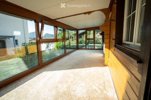 Charmante 5½-Zimmer-Wohnung im Chalet mit Wintergarten und grossem Privatgarten 9