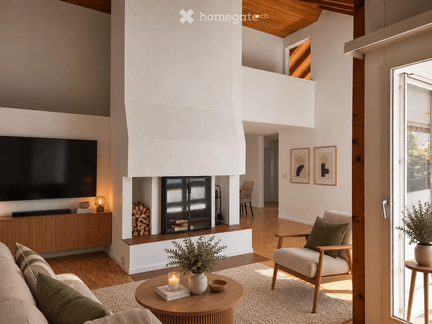 Modern living room with a fireplace, a large TV screen, a sofa, coffee table, armchair, and decorative items.