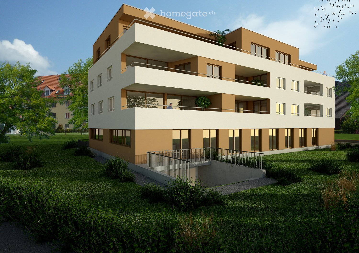 Modern two-story building with beige and white facade, multiple balconies, large windows, and a raised ground floor entrance.