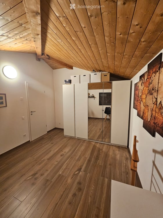 ELEGANTE ATTICO MANSARDATO CON SPLENDIDA VISTA LAGO E TERRAZZA PANORAMICA 8