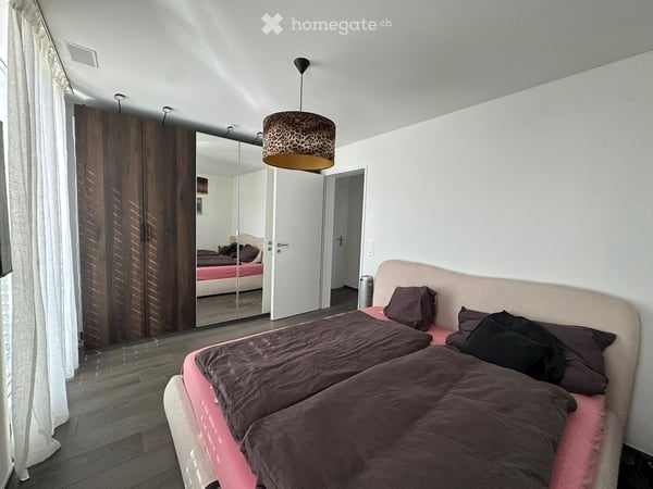 Moderne 2,5-Zimmer-Neubauwohnung mit Parkplatz und Lift - ruhig, hell und naturnah gelegen 4