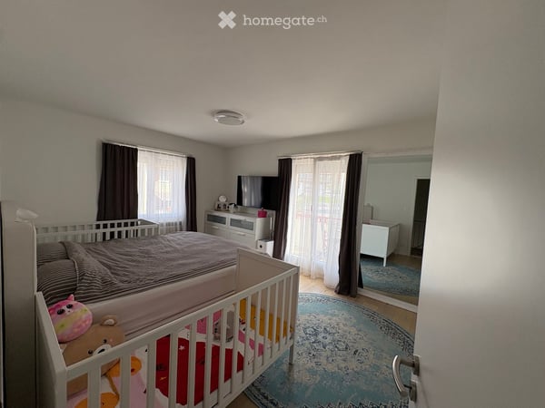 Renovierte 5.5-Zimmer-Doppelhaushälfte mit Studio, Wintergarten & Wärmepumpe 4