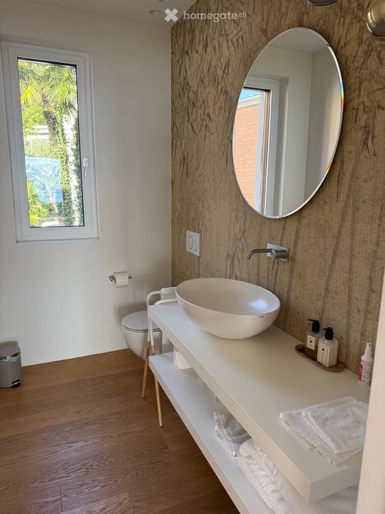 Ampio appartamento con grande terrazza e vista lago a Ruvigliana 8