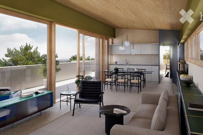 Modern open-plan living and dining area with large windows offering a scenic view, featuring a sofa, coffee table, dining table with chairs, and a sleek kitchen area with pendant lights.
