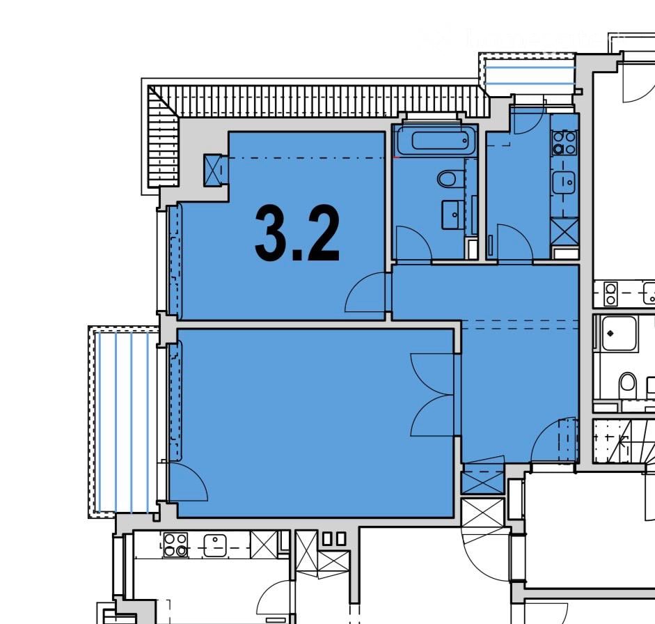 Floor plan showing a large open space labeled3.2, with several smaller rooms and bathrooms around it.