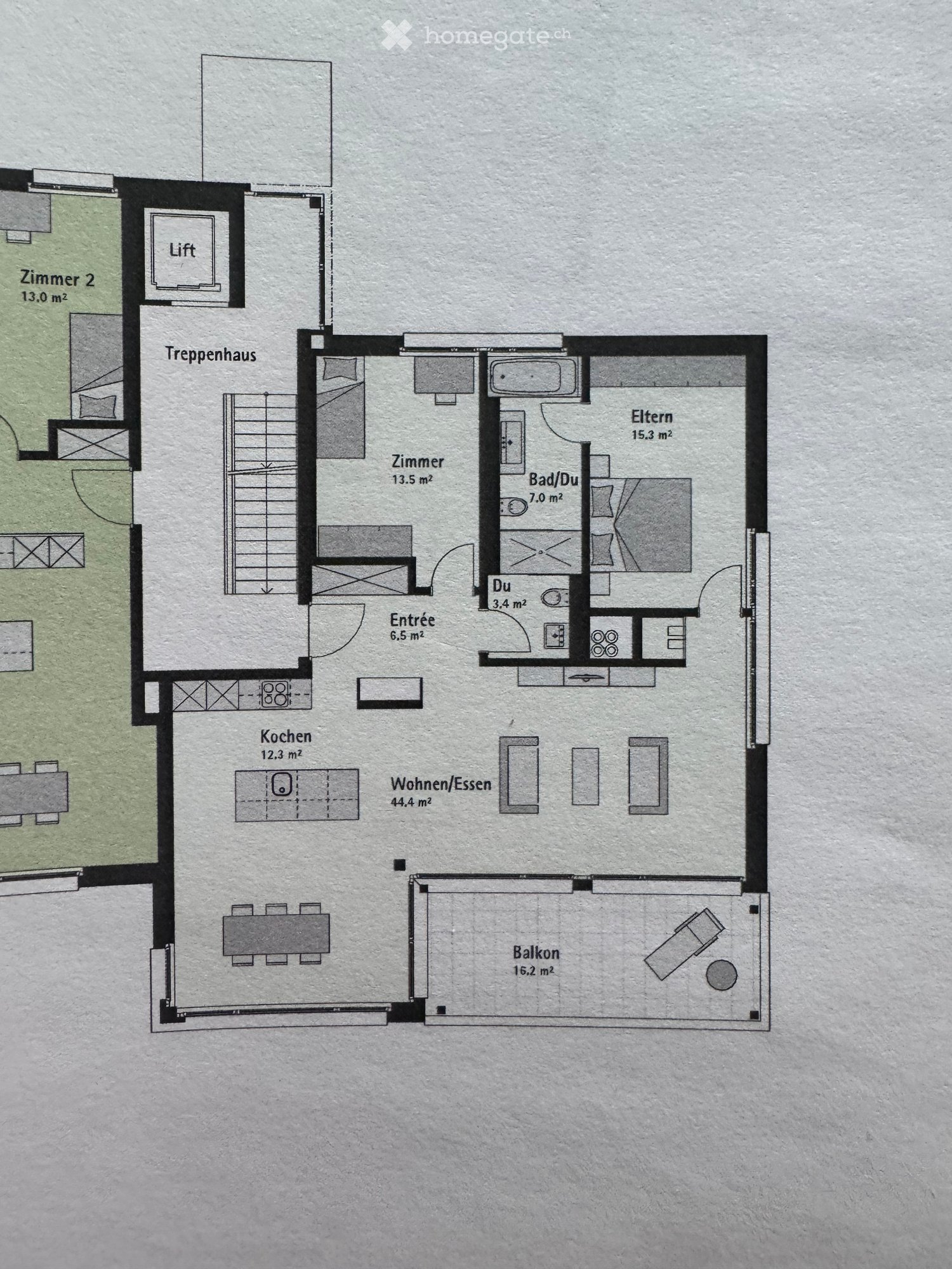 Floor plan of a residential unit with multiple rooms including a kitchen, living/dining area, bedrooms, bathrooms, and a balcony.
