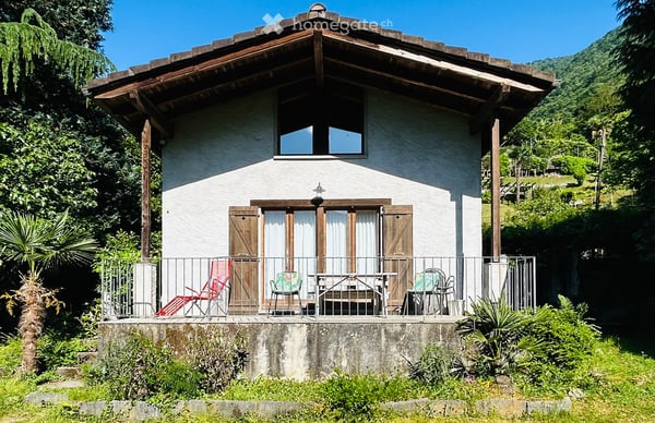 Idyllisches Ferienhaus mit riesigen Garten & Seesicht