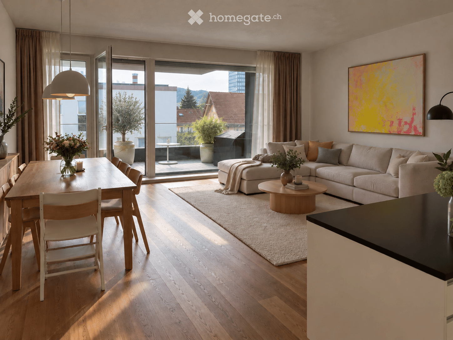 Modern living and dining area with light wood flooring, large windows, a sectional sofa, coffee table, dining table with chairs, and decorative vases.