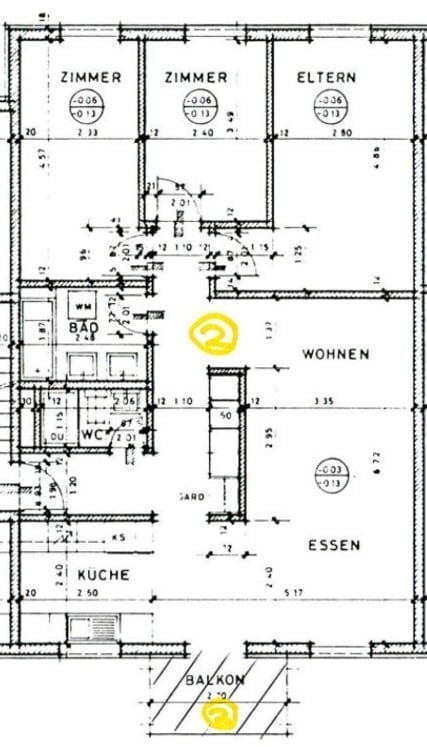 Floor plan of a house with multiple rooms including a kitchen, living area, bedrooms, and a balcony.