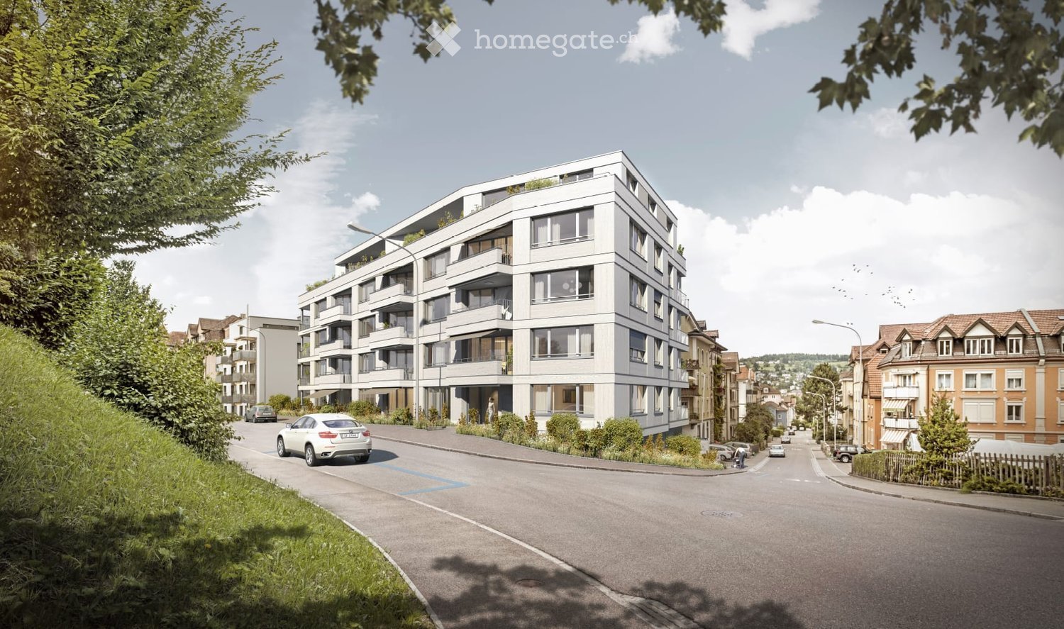 New apartment building with balconies, several floors, surrounded by greenery, modern design, white exterior.