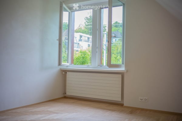 Exceptional Attic Apartment in Thalwil with 180° Views of Lake Zurich and the Alps 9