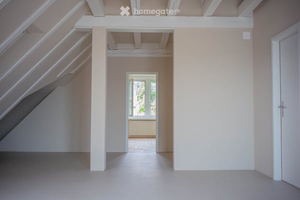 Exceptional Attic Apartment in Thalwil with 180° Views of Lake Zurich and the Alps 6