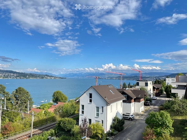 Exceptional Attic Apartment in Thalwil with 180° Views of Lake Zurich and the Alps 10
