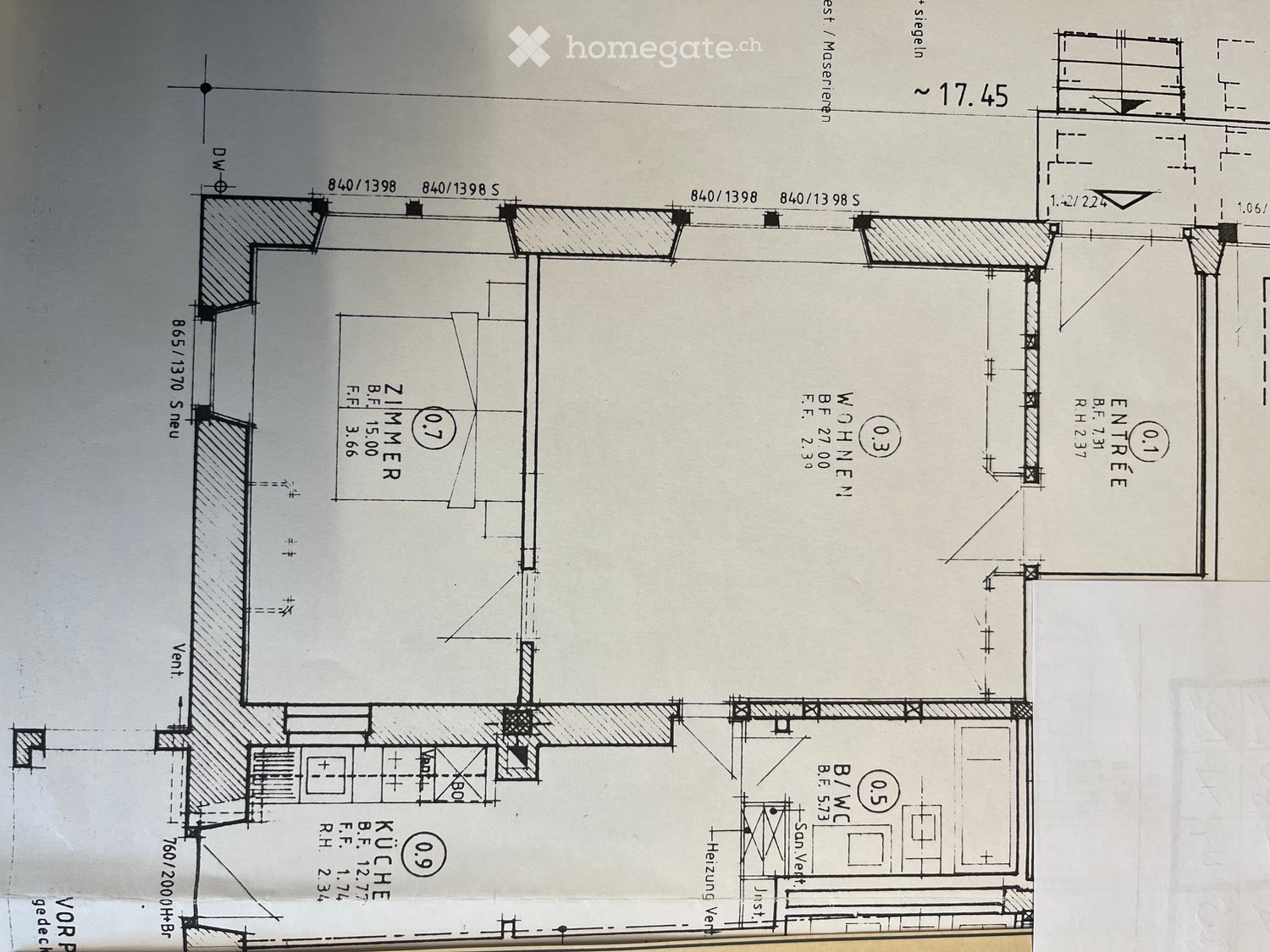 Floor plan showing a kitchen, living room, two bedrooms, and an entrance area with labeled dimensions and room labels.