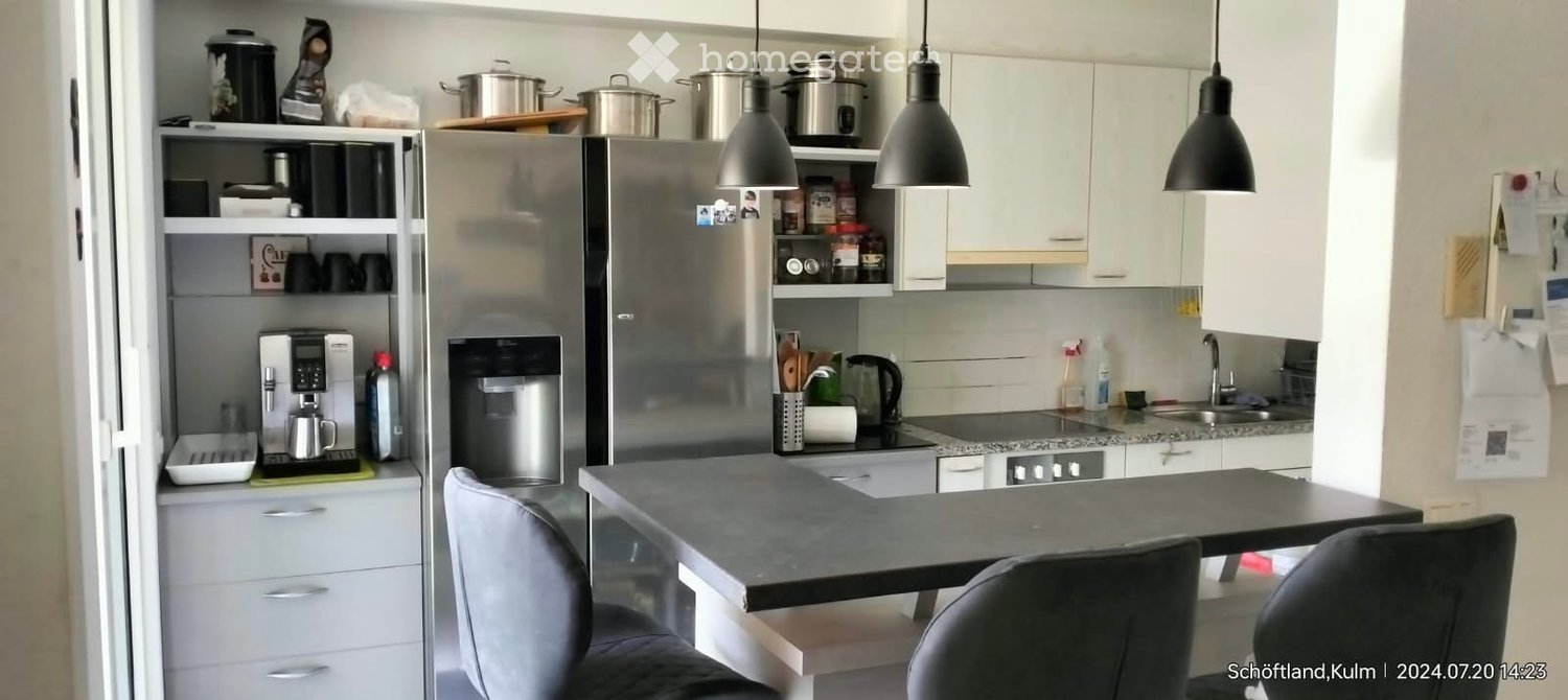 {"type": "Kitchen", "objects": ["refrigerator", "coffee machine", "sink", "faucet", "chair", "table", "cupboard", "pot", "pan", "keurig", "cup", "bottle", "fridge", "cupboard", "cupboard", "cupboard", "cupboard", "cupboard", "cupboard", "cupboard", "cupbo